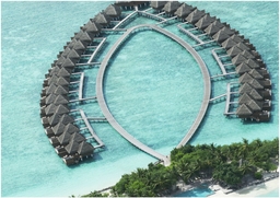 Taj Exotica Resort And Spa Logo